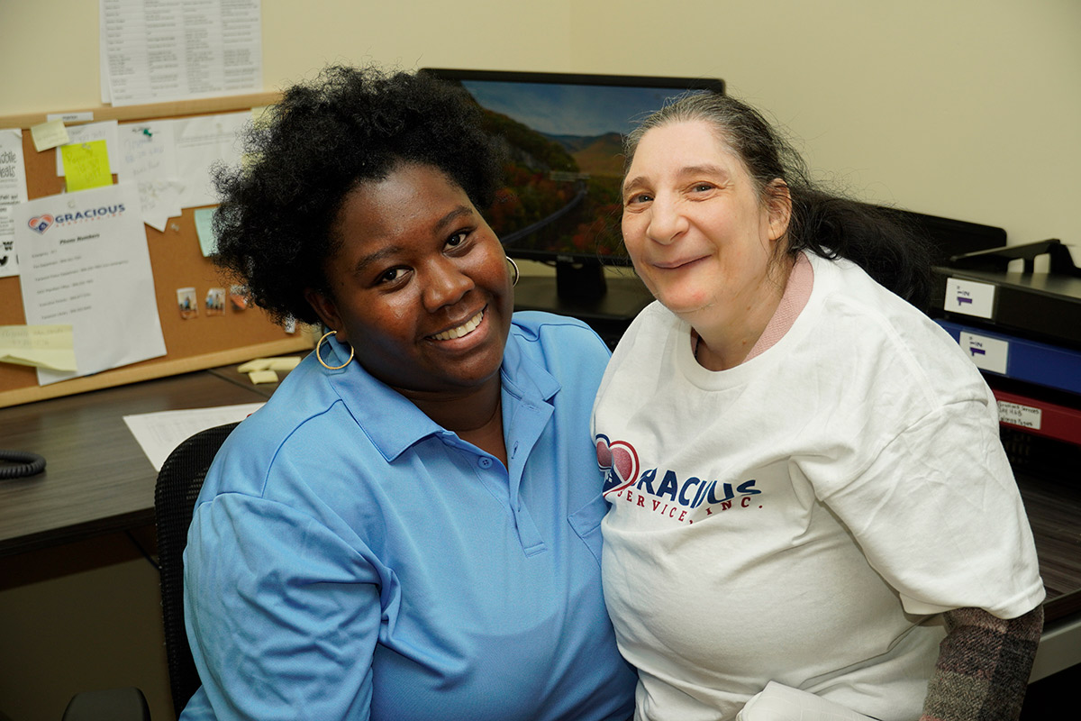 Gracious Services staffer, Danahisha and Margaret mug for the cameras