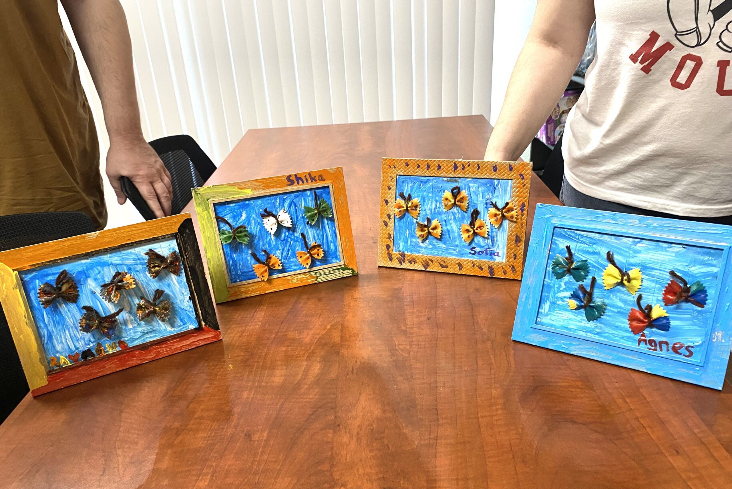 Handmade butterfly crafts in colorful frames